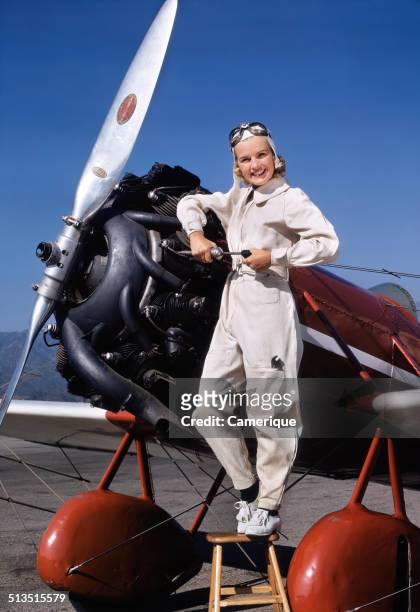 Pinup girl airplane mechanic, Los Angeles, California, 1949.