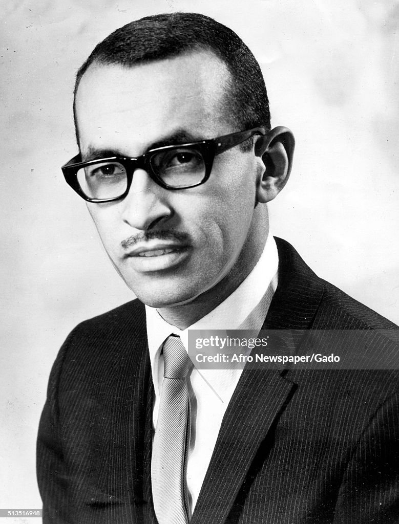 A photographic portrait of Wyatt Tee Walker wearing a suit and... News