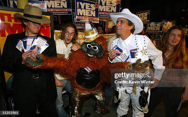 Filmmakers Dan Ollman C and Sarah Price with Yes Men Andy Bichlbaum , Patrick Lichty and Mike Bonano arrive to the premiere of United Artists' film...