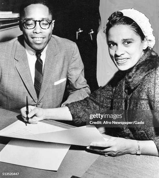 Marguerite Belafonte signing a contract, February 10, 1959.