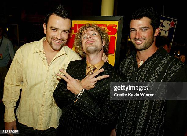 Survivor's Ryan O'Paray, Jonny Fairplay and Burton Roberts arrive to the premiere of United Artists' film "The Yes Men" on the opening night of the...