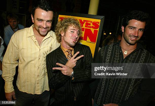 Survivor's Ryan O'Paray, Jonny Fairplay and Burton Roberts arrive to the premiere of United Artists' film "The Yes Men" on the opening night of the...