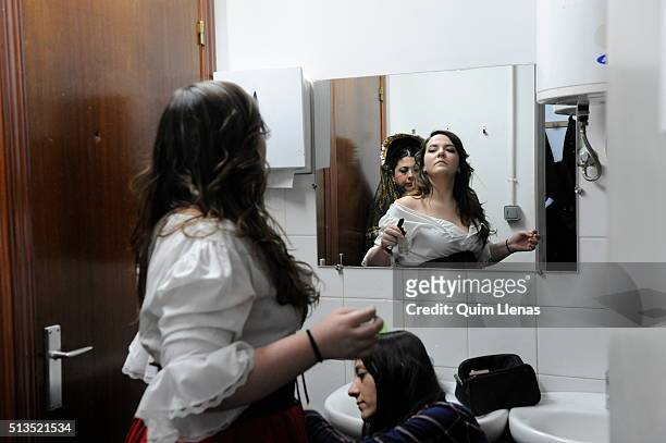 Artists of the Estudio Lirico Company dress, makeup and prepare in the dressing room before going on stage for the dress rehearsal of Verdi’s...