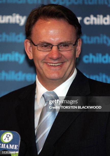 Australian Federal opposition leader Mark Latham is all smiles as he campaigns in Sydney, 24 September 2004. Latham's Labor Party is currently...