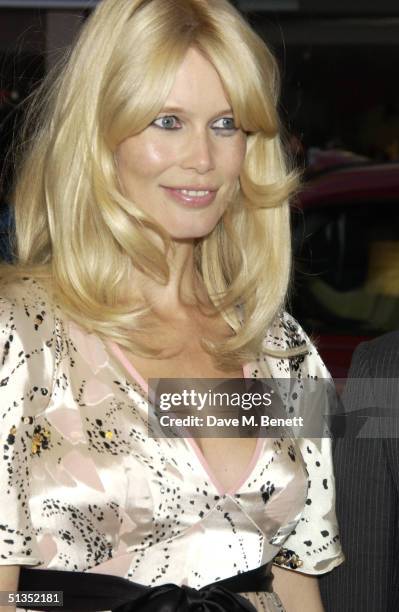 Model Claudia Schiffer arrives at the UK Premiere of "Layer Cake" at The Electric Cinema, Portobello Road on September 23, 2004 in London.