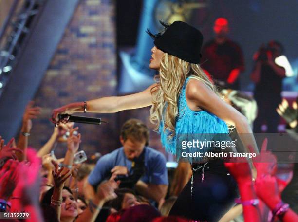 Ivy Queen performs onstage at the 1st Annual Premios Juventud Awards at the James L. Knight Center September 23, 2004 in Miami, Florida. Premios...