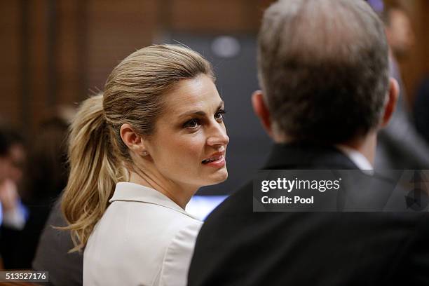 Sportscaster and television host Erin Andrews, left, talks with her attorney, Randy Kinnard, March 3 in Nashville, Tennessee. Andrews is taking legal...