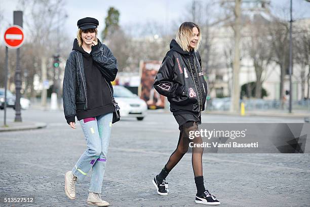 Models Edie Campbell and Binx Walton leave after the Chloe show at the Grand Palais during Paris Fashion Week FW 16/17 on March 3, 2016 in Paris,...