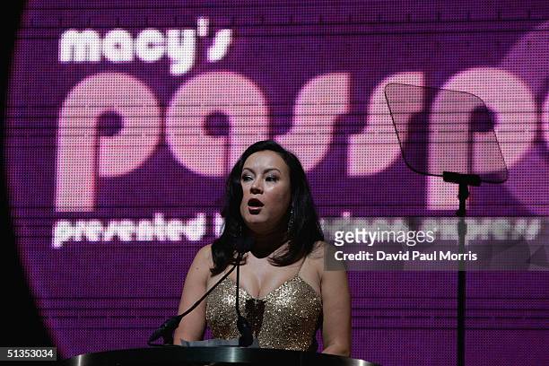 Actress Jennifer Tilly reads a letter from Elizabeth Taylor at the beginning of the 22nd annual Macy's Passport 04 evolution/revolution presented by...