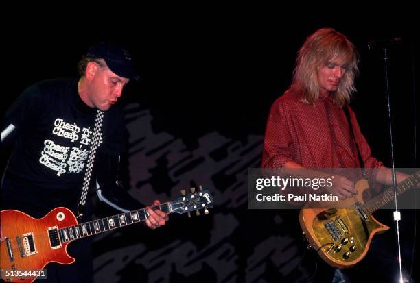 American musicians Rick Nielsen and Robin Zander of Cheap Trick perform onstage, Chicago, Illinois, June 15, 1990.