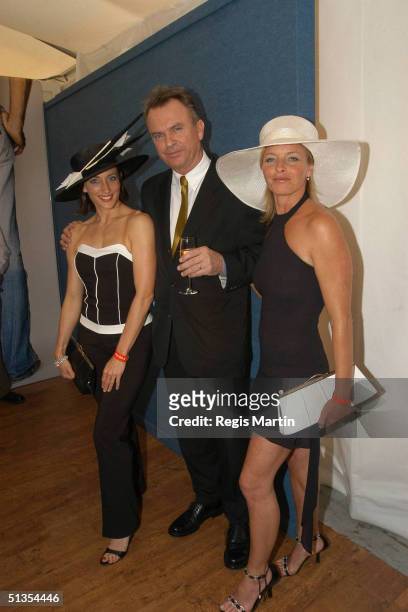 November 2003 - Australian actors GEORGIE PARKER, SAM NEIL and TAMMY MACINTOSH at the Flemington Racecourse for the Melbourne Cup Day during the...