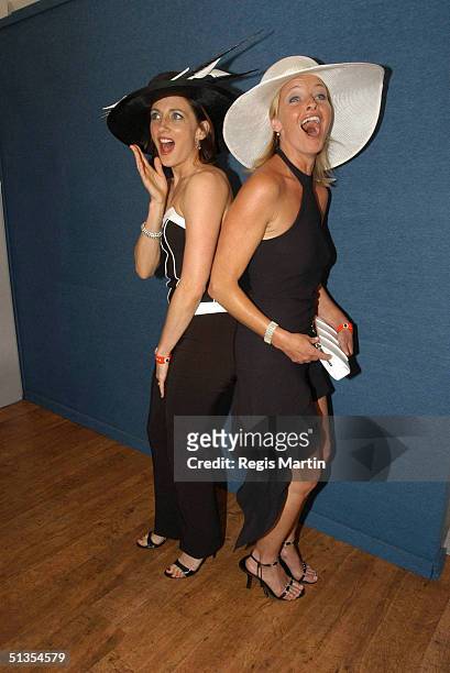 November 2003 - Australian actors GEORGIE PARKER and TAMMY MACINTOSH , at the Flemington Racecourse for the Melbourne Cup Day during the Melbourne...