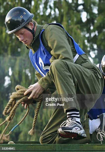 Prince Harry takes part in a command task exercise at the British Army's Regular Commissions Board held over four days at Westbury September 24, 2004...