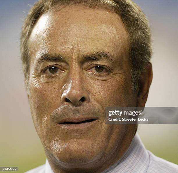 Al Michaels, ABC Sports Monday Night Football play-by-play announcer talks on the field before the game between the Green Bay Packers and the...