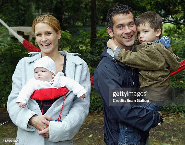 Actress Anja Kling, her husband Jens Solf, their baby daughter Alea Jolie and their son Tano attend a social event September 24, 2004 in...