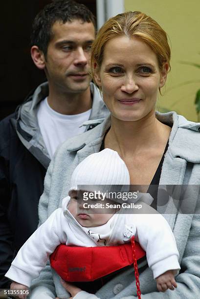 Actress Anja Kling, her husband Jens Solf and their baby daughter Alea Jolie attend a social event September 24, 2004 in Wilhelmshorst near Potsdam,...