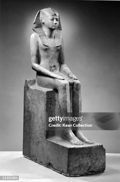 White limestone statue entitled 'Seated Figure of Hatshepsut' from the XVIII Dynasty, c. 1495 B.C. Hatshepsut was the queen of Egypt from 1495 - 1468...