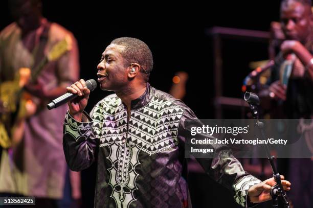 Senegalese singer Youssou N'Dour performs with his band, Super Etoile de Dakar, during the 2014 Next Wave Festival at the BAM Howard Gilman Opera...