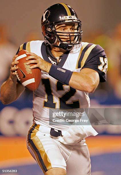 Quarterback John Beck looks to pass against Boise State September 29, 2004 at Broncos Stadium in Boise, Idaho.