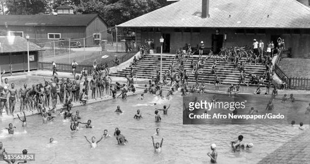 African-American children in a segregated swimming pool at Druid Hill Park, Baltimore, Maryland, July 4, 1940.