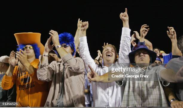 Boise State fans celebrate after BYU missed a game winning field goal September 24, 2004 at Broncos Stadium in Boise, Idaho. BSU won the game over...