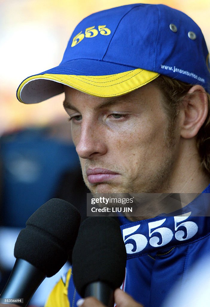Button Racing Driver Honda's driver Jenson Button talks to the press after the qualifying ...