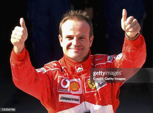 Ferrari's Rubens Barrichello gives a thumbs up to journalists after taking Pole position during the qualifying session for the inaugural Formula One...