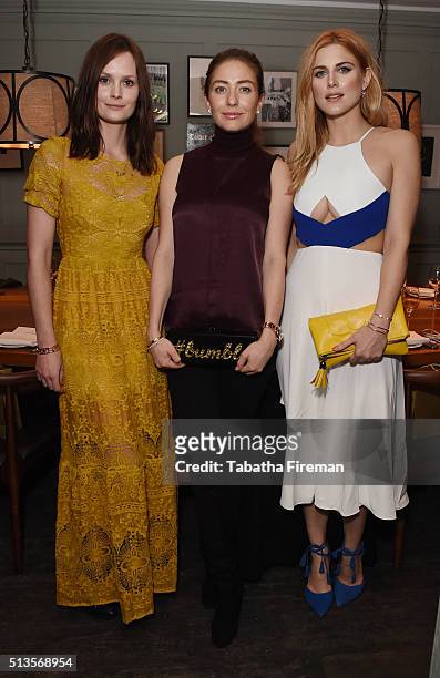 Charlotte De Carle, Whitney Wolfe and Ashley James attend a private dinner hosted by Whitney Wolfe founder and CEO of Bumble dating app at Soho House...