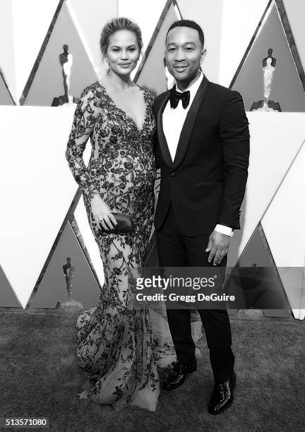 Chrissy Teigen and John Legend arrive at the 88th Annual Academy Awards at Hollywood & Highland Center on February 28, 2016 in Hollywood, California.