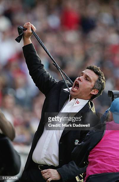 Mark Williams coach of the Power shows his emotions with minutes to play during the AFL Grand Final between the Port Adelaide Power and Brisbane...