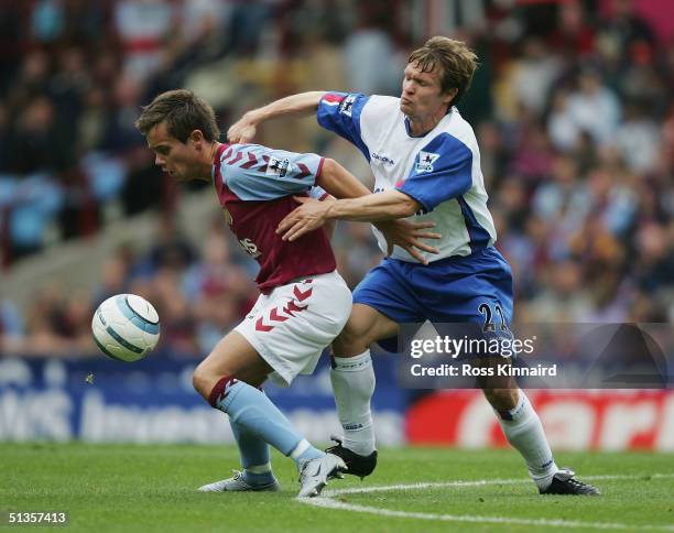Lee Hendrie of Villa is challenged by Joonas Kolkka of Palace during the Barclays Premiership match between Aston Villa and Crystal Palace at Villa...