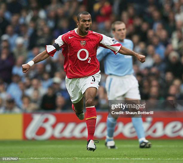 Ashley Cole of Arsenal celebrates after scoring during the Barclays Premiership match between Manchester City and Arsenal at the City of Manchester...