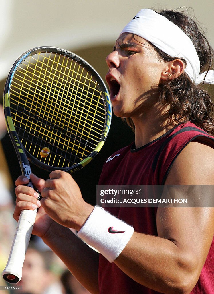 Spaniard Rafael Nadal jubilates after he