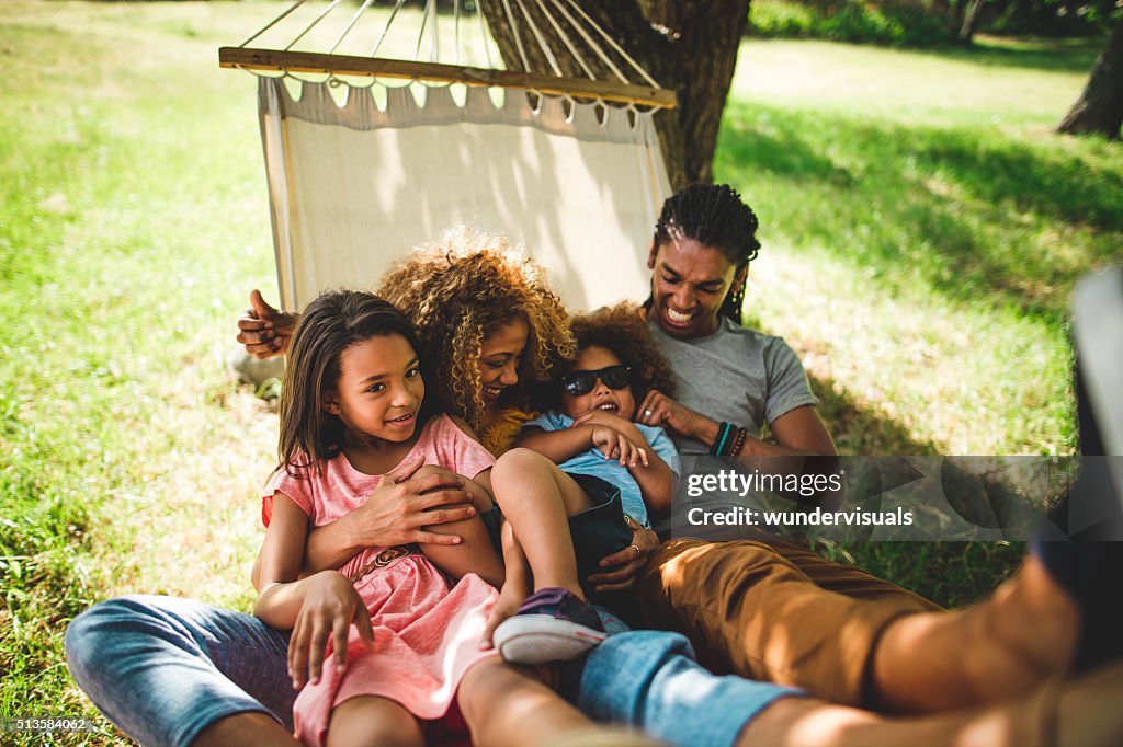 Attractive African-american family spending family time in a bea