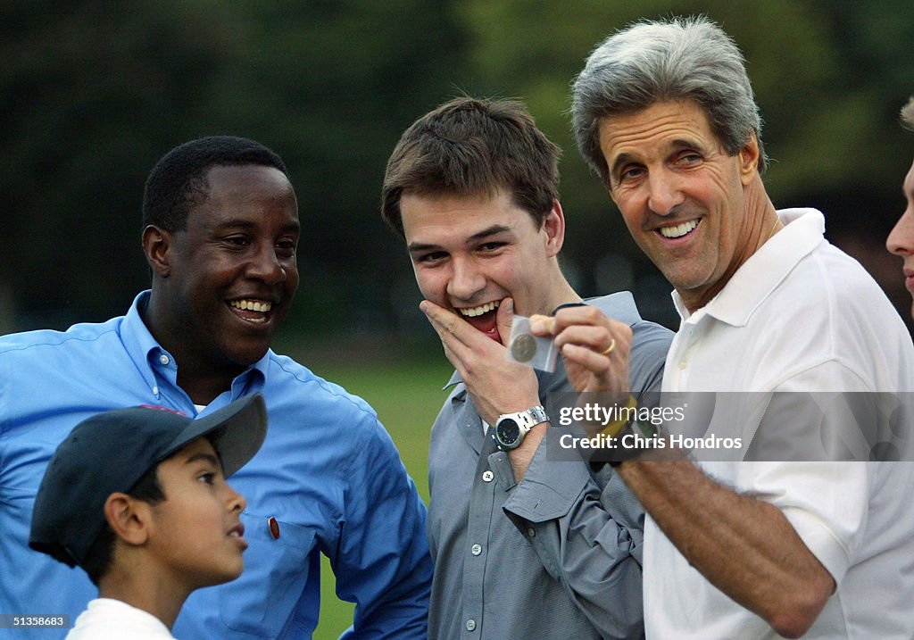 John Kerry Plays Football In Boston