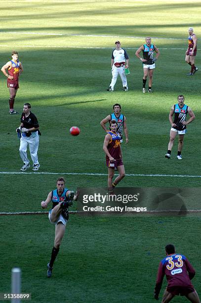 Action on the ground at the AFL Grand Final between the Port Adelaide Power and the Brisbane Lions at the Melbourne Cricket Ground September 25, 2004...