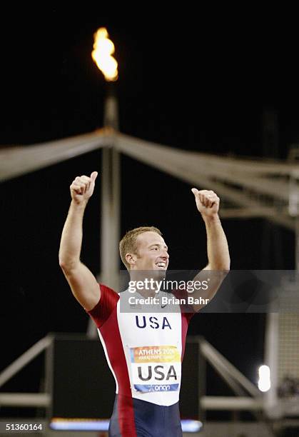 Casey Tibbs of the USA celebrates after taking the gold medal in the Men's 4X100 Relay during the 2004 Paralympic Games, on September 26, 2004 in...