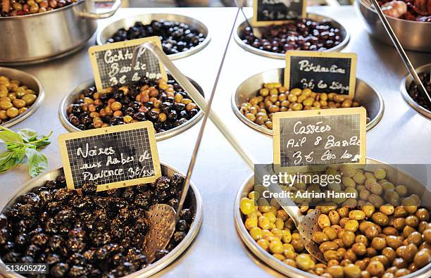 black olives, green olives and other antipasti at market - kalamata olive fotografías e imágenes de stock
