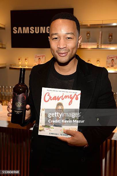 John Legend poses during Chrissy Teigen's launches "Cravings" at Samsung 837 on March 3, 2016 in New York City.