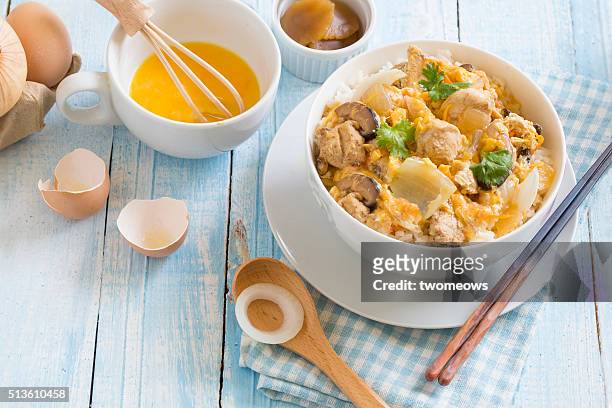 japanese food oyako donburi chicken with egg on steamed rice. - rice bowl stock pictures, royalty-free photos & images