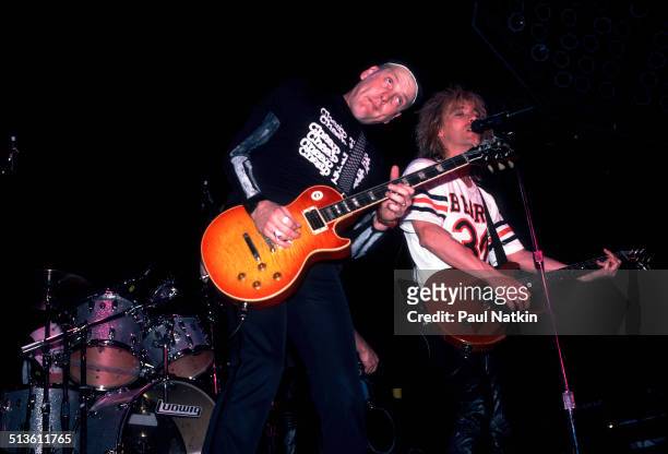 American musicians Rick Nielsen and Robin Zander of the band Cheap Trick perform at the Riviera Theater, Chicago, Illinois, 1980s.
