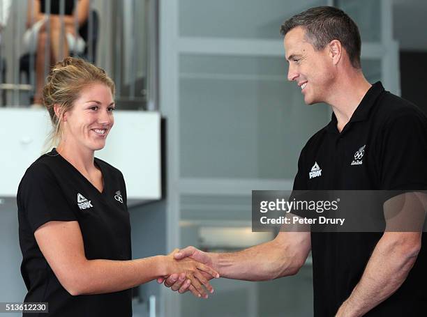 New Zealand rower Kerri Gowler is congratulated by NZOC Chef de Mission Rob Waddell during the New Zealand Olympic Rowing Team Announcement at Lake...