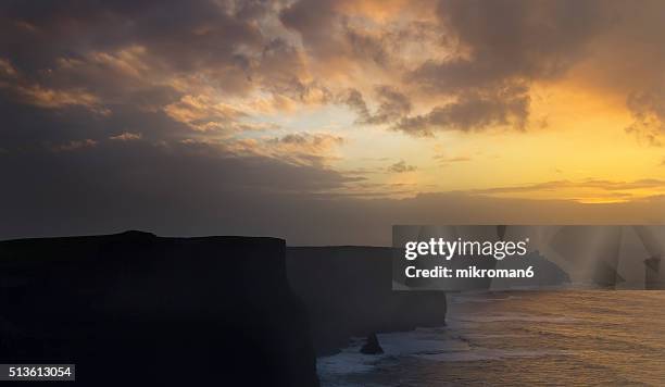 cliffs of moher sunset time - costal surface human lung stock pictures, royalty-free photos & images