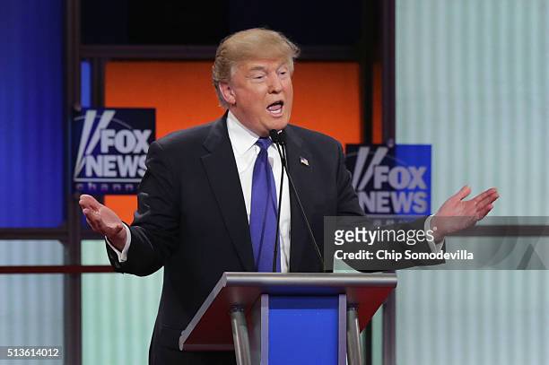 Republican presidential candidate Donald Trump participates in a debate sponsored by Fox News at the Fox Theatre on March 3, 2016 in Detroit,...