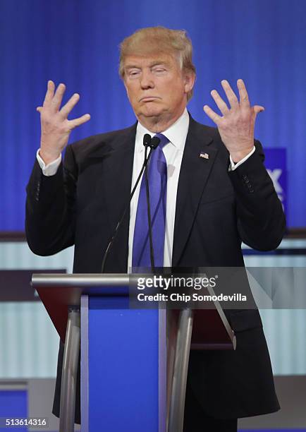 Republican presidential candidate Donald Trump participates in a debate sponsored by Fox News at the Fox Theatre on March 3, 2016 in Detroit,...