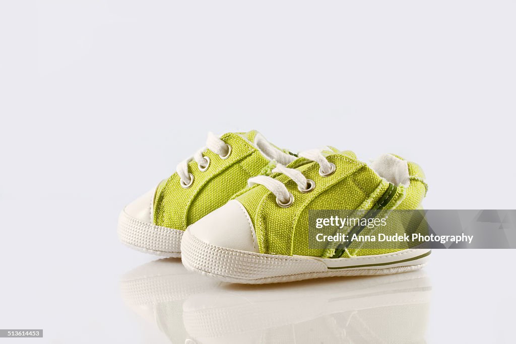 Green baby shoes