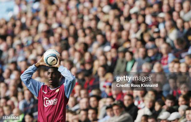 Jlloyd Samuel of Aston Villa takes a throw in during the Barclays Premiership match between Aston Villa and Crystal Palace at Villa Park, on...