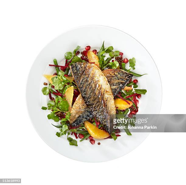 mackerel and orange salad on white plate - omega stock pictures, royalty-free photos & images