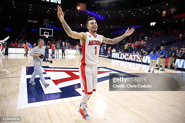 Gabe York of the Arizona Wildcats celebrates as he runs off the court after the college basketball game against the California Golden Bears at McKale...