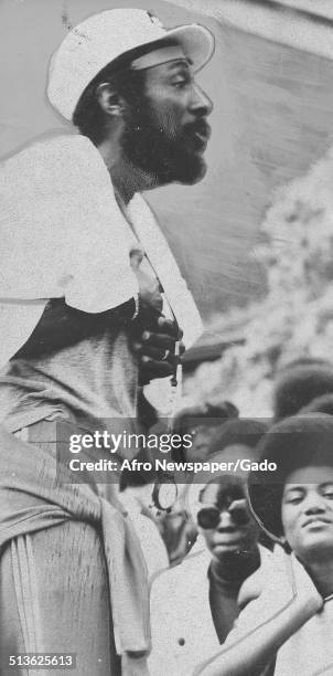 Writer and social activist Dick Gregory, with a crowd, July 29, 1971.